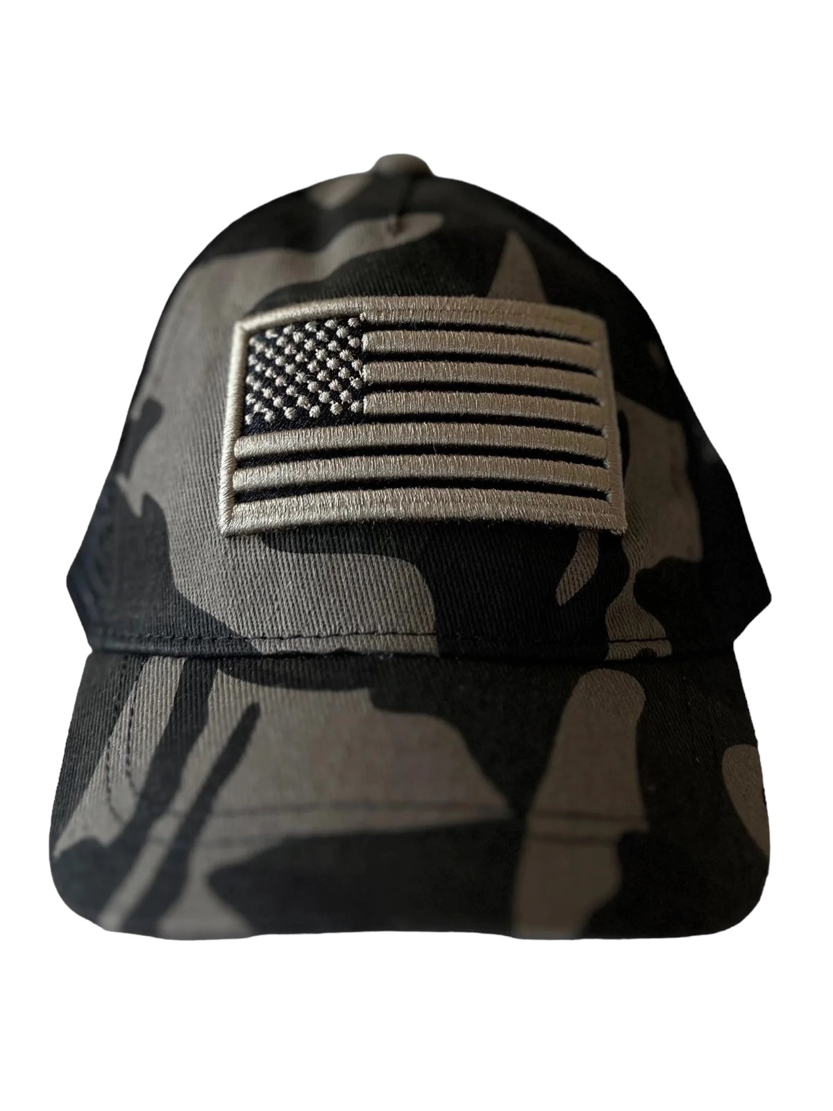 Camo baseball cap with an embroidered American flag on the front.