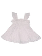 White sleeveless dress with ruffled straps and a tiered skirt, featuring eyelet detailing throughout.