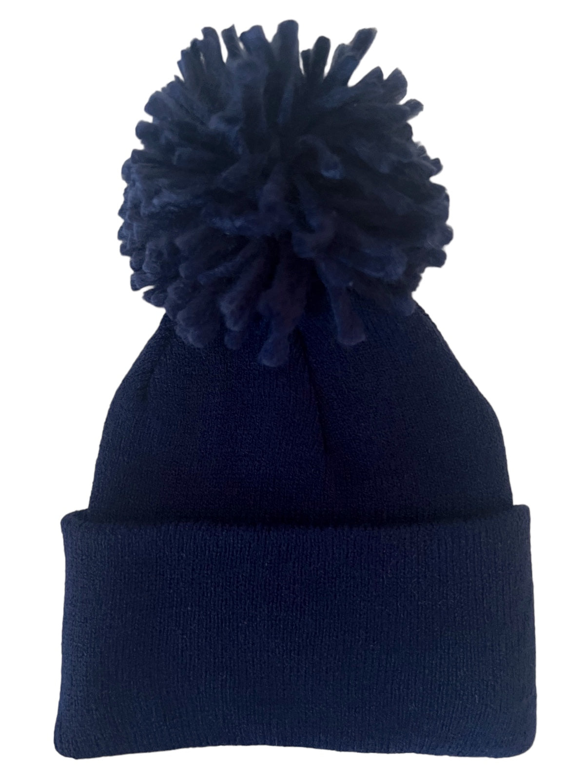 Navy beanie hat with a large pom-pom on top, featuring a folded cuff at the bottom.