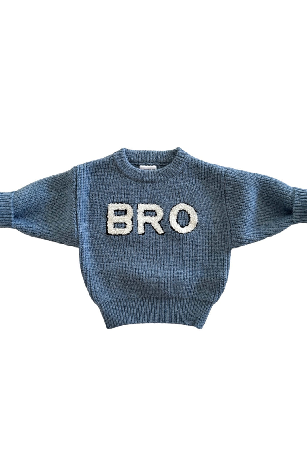 Blue knit sweater with "BRO" in white letters on the front, featuring wide sleeves and a cozy design.