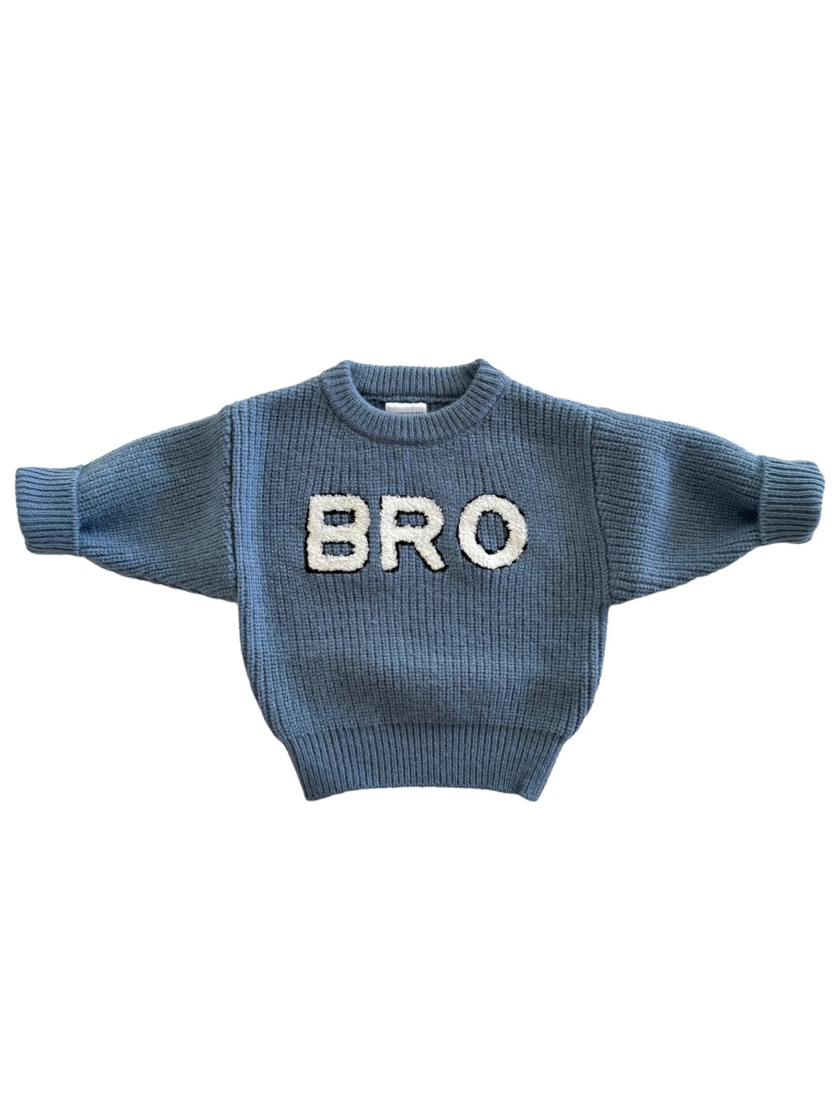 Blue knit sweater with "BRO" in white letters on the front, featuring wide sleeves and a cozy design.