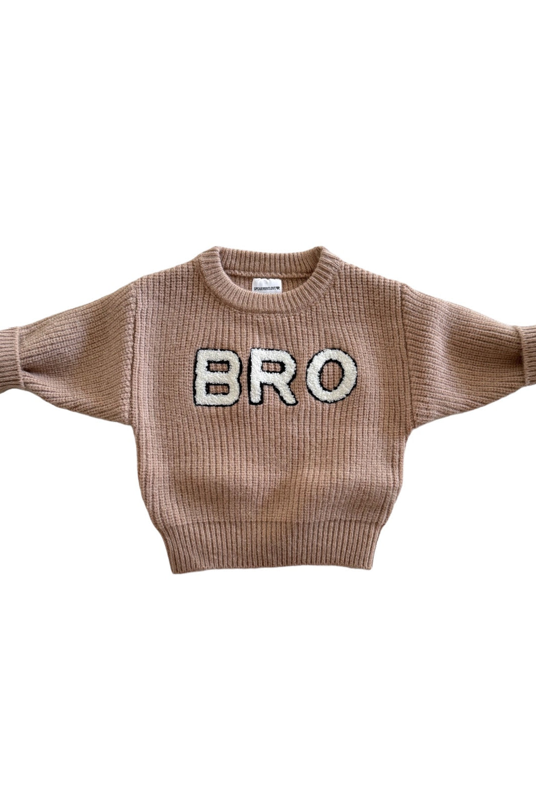 Tan knitted sweater with the word "BRO" in bold letters across the front.