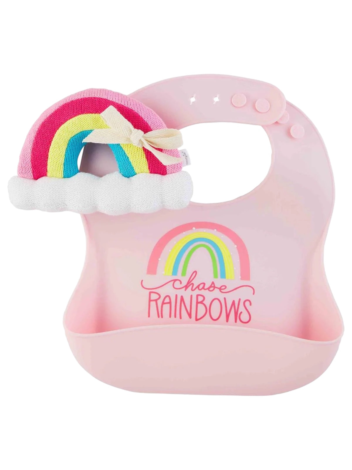 Pink bib with "Chase Rainbows" text and a colorful rainbow toy attached.