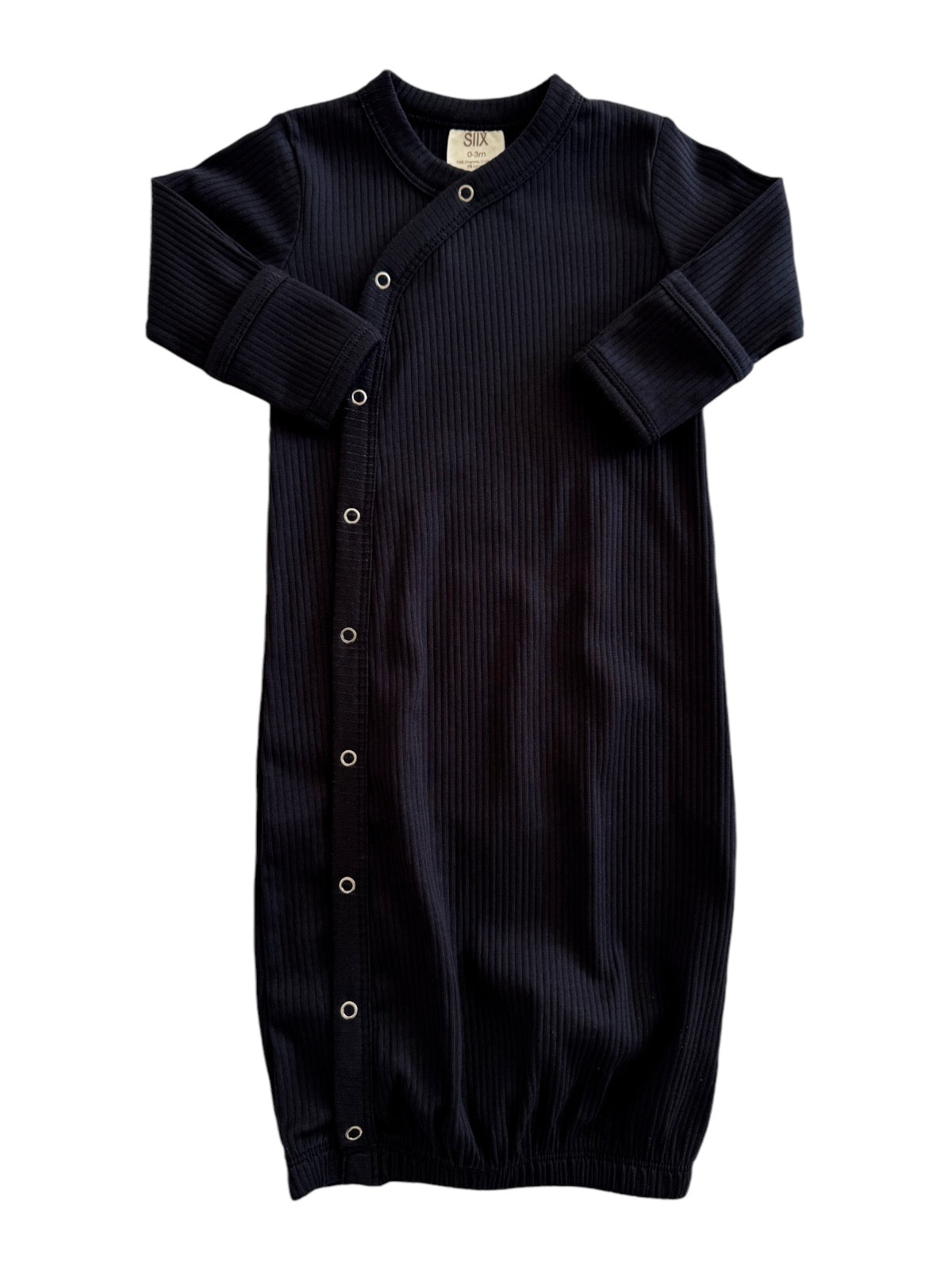 Black ribbed baby gown with long sleeves and snap closures, designed for comfort and easy dressing.