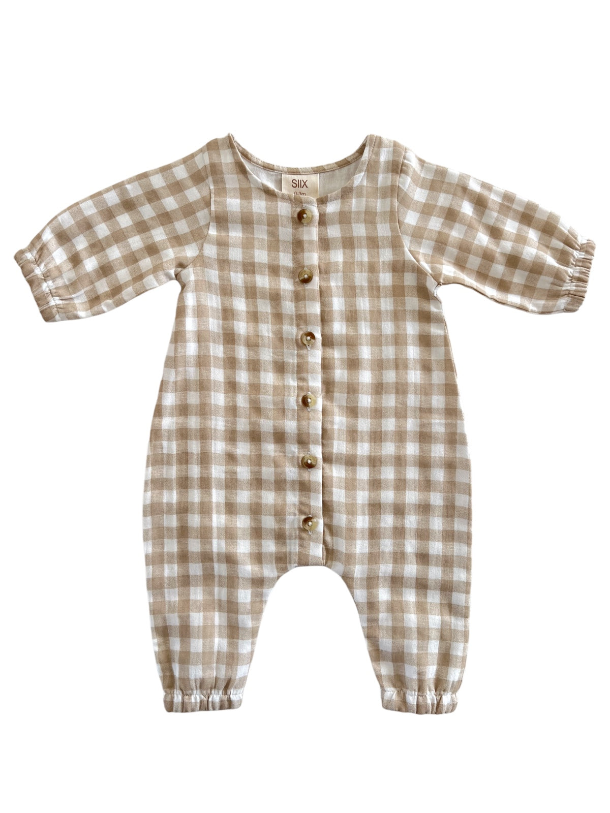 Beige gingham toddler romper with long sleeves and wooden buttons down the front. Casual and stylish baby outfit.
