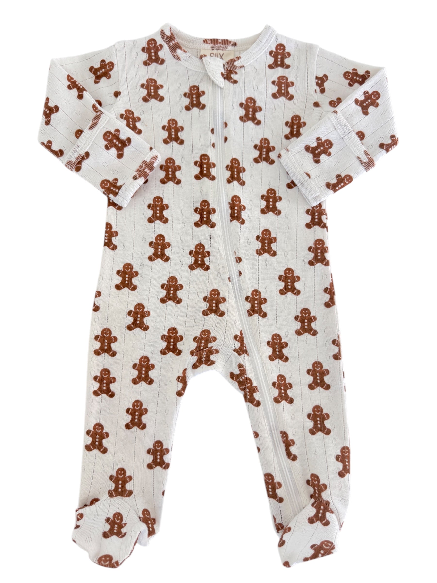 White onesie covered in gingerbread man prints, featuring long sleeves and a front zipper. Perfect for cozy wear.