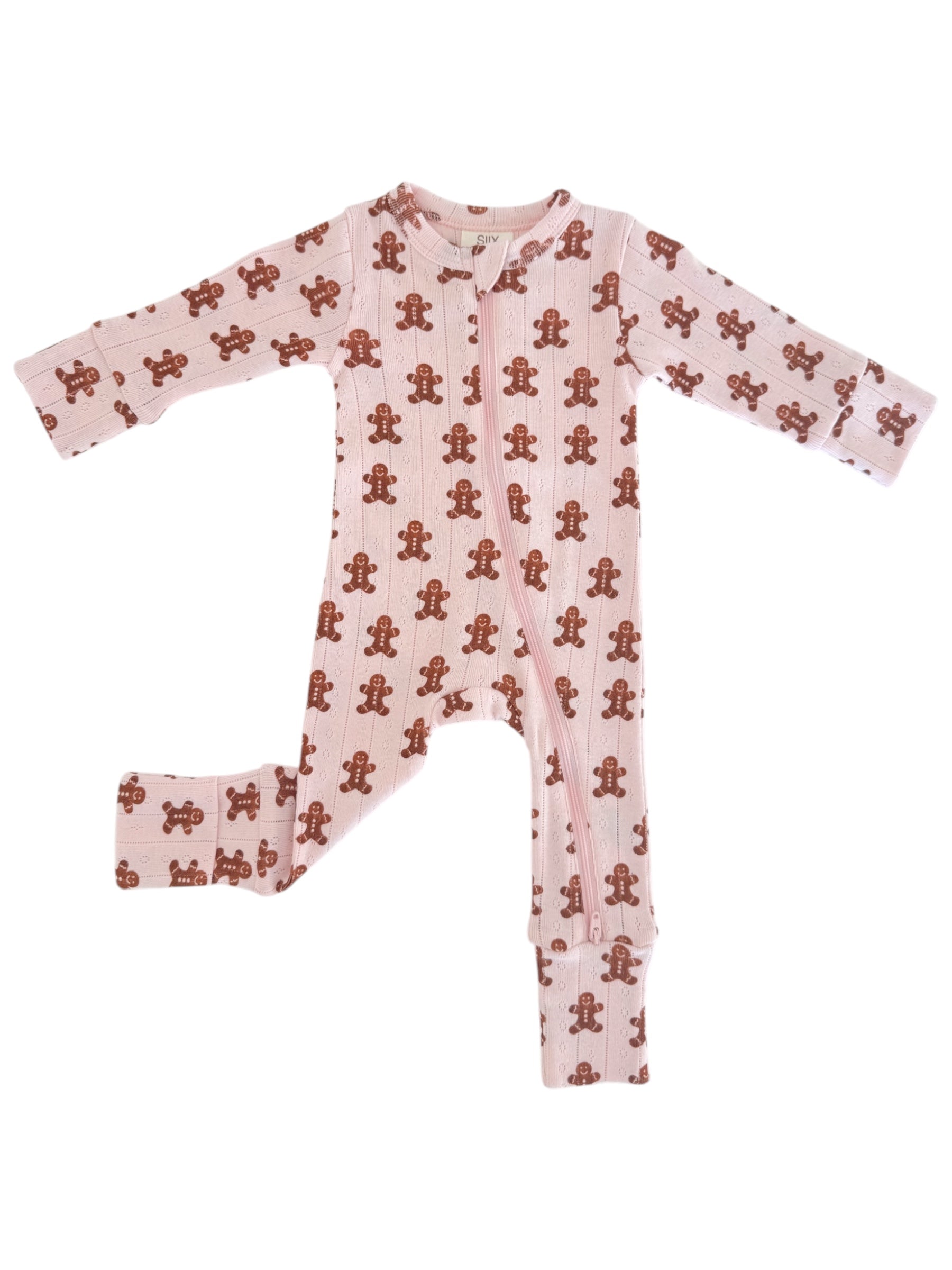 Pink onesie with gingerbread man pattern, featuring long sleeves and front zip closure for infants.