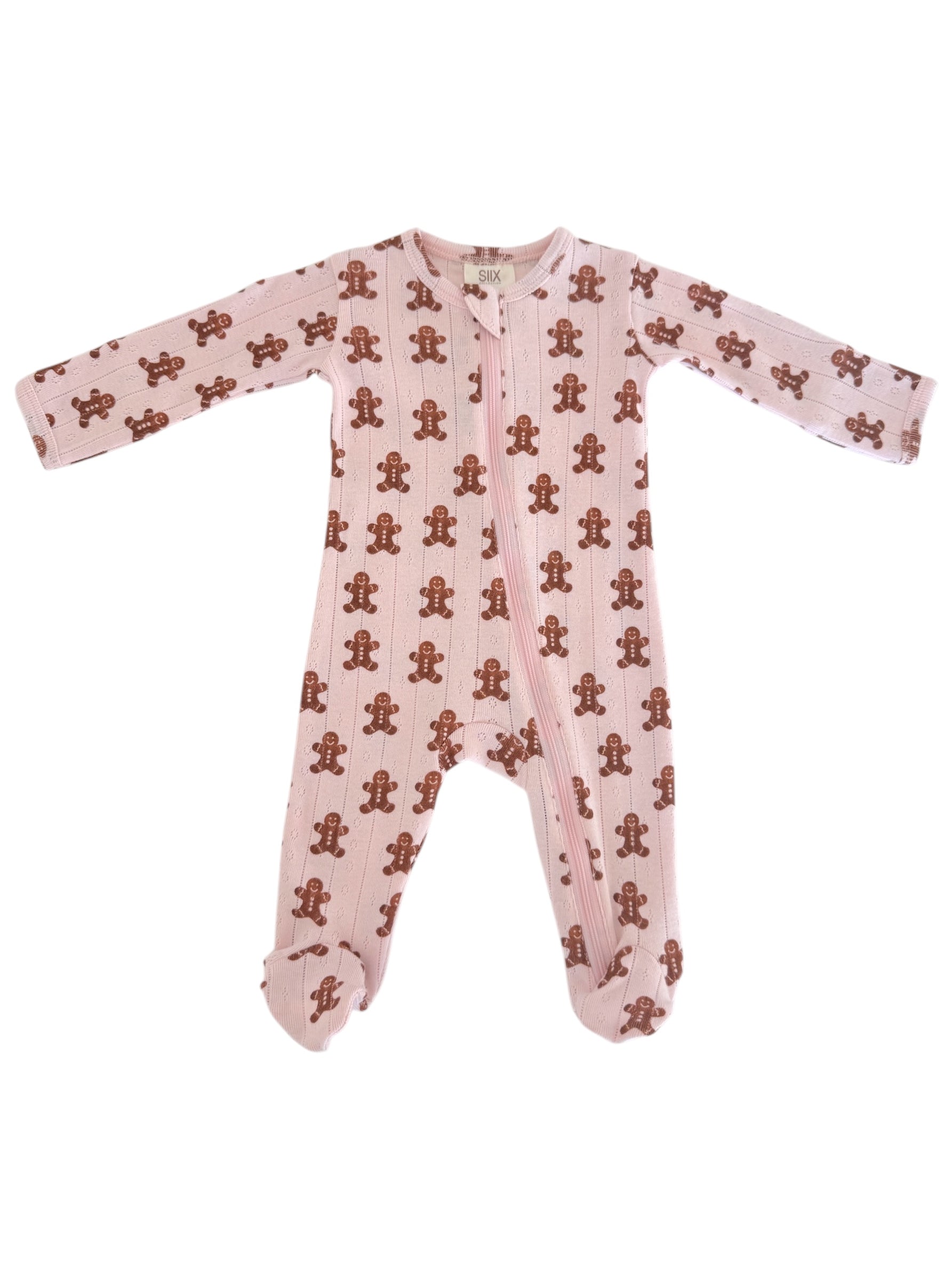 Pink toddler onesie with brown gingerbread man print, featuring long sleeves and a front zipper.