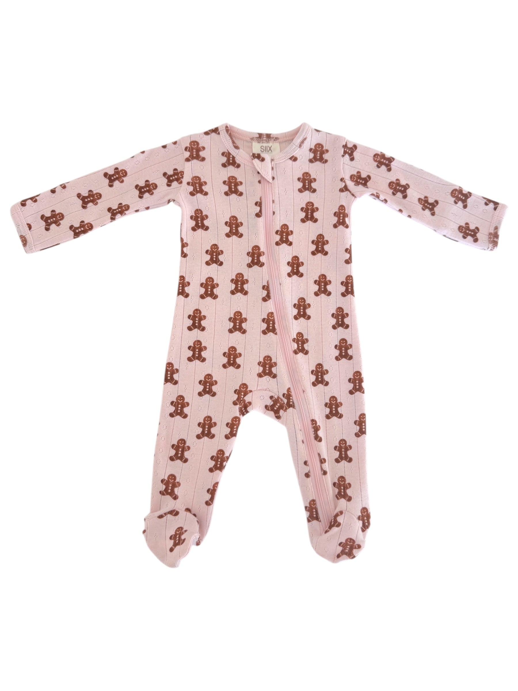 Pink toddler onesie with brown gingerbread man print, featuring long sleeves and a front zipper.