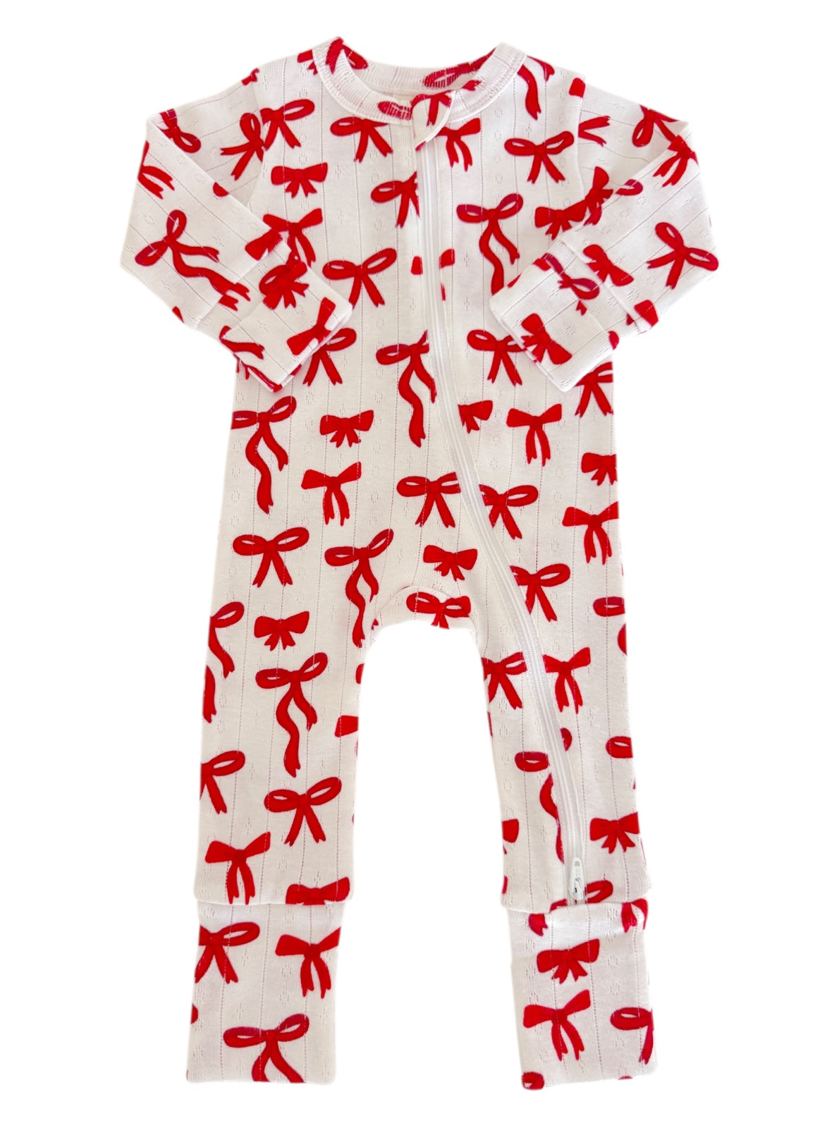 White onesie with red bows, featuring a full zip and long sleeves, perfect for infants or toddlers.