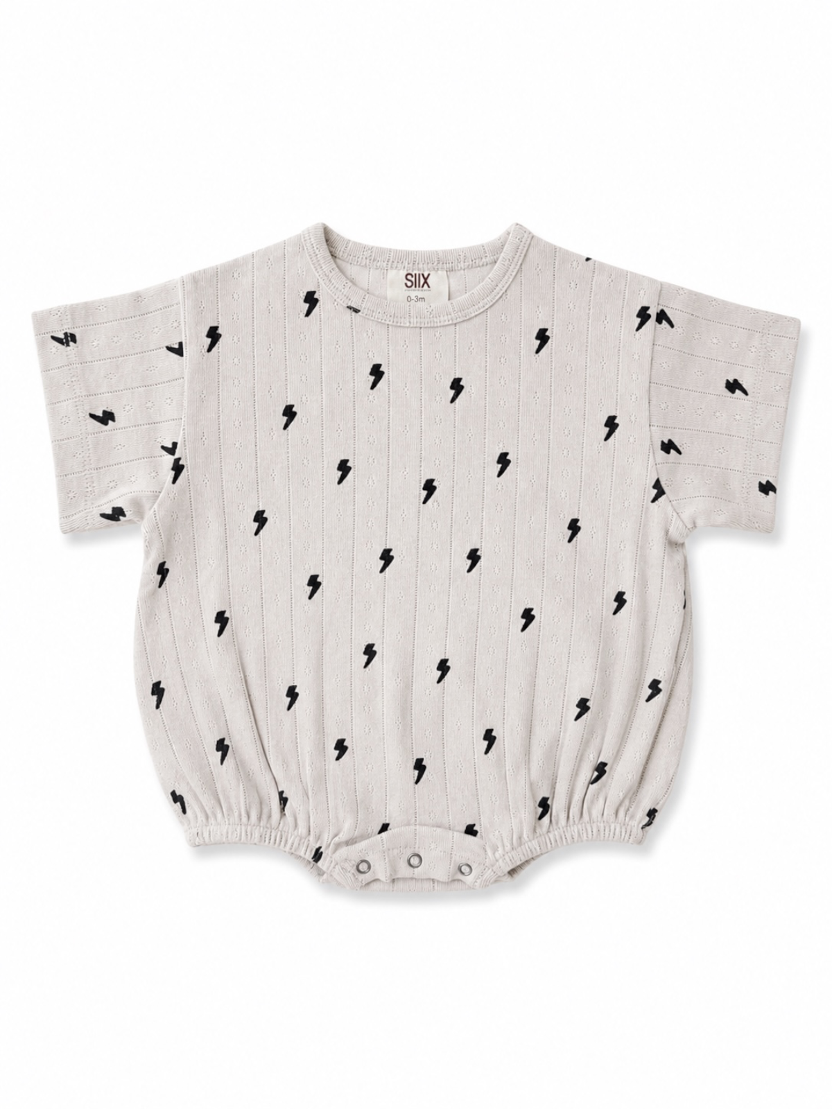 Light gray baby onesie with black lightning bolt print and short sleeves, featuring snap closure at the bottom.