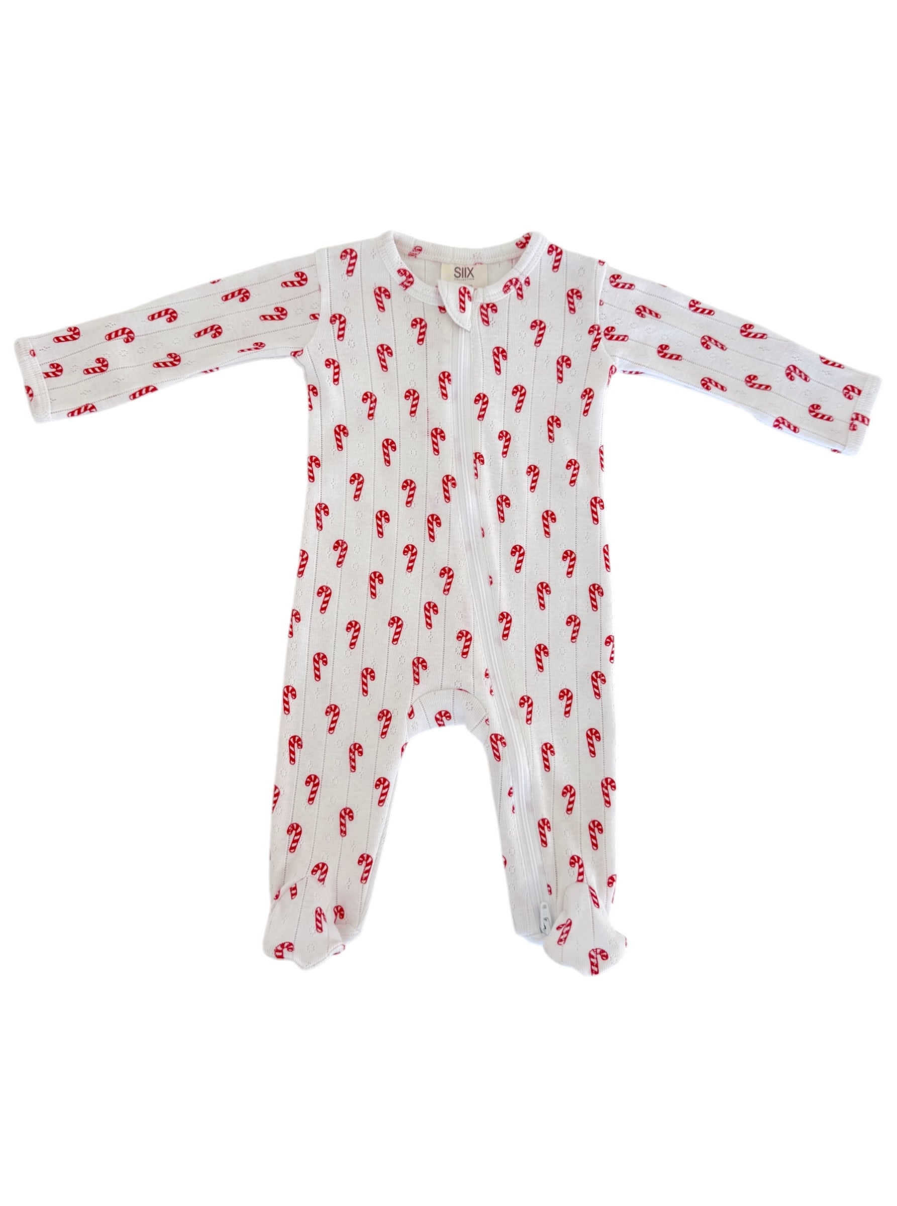 White baby onesie with red candy cane print, featuring long sleeves and full-length legs.