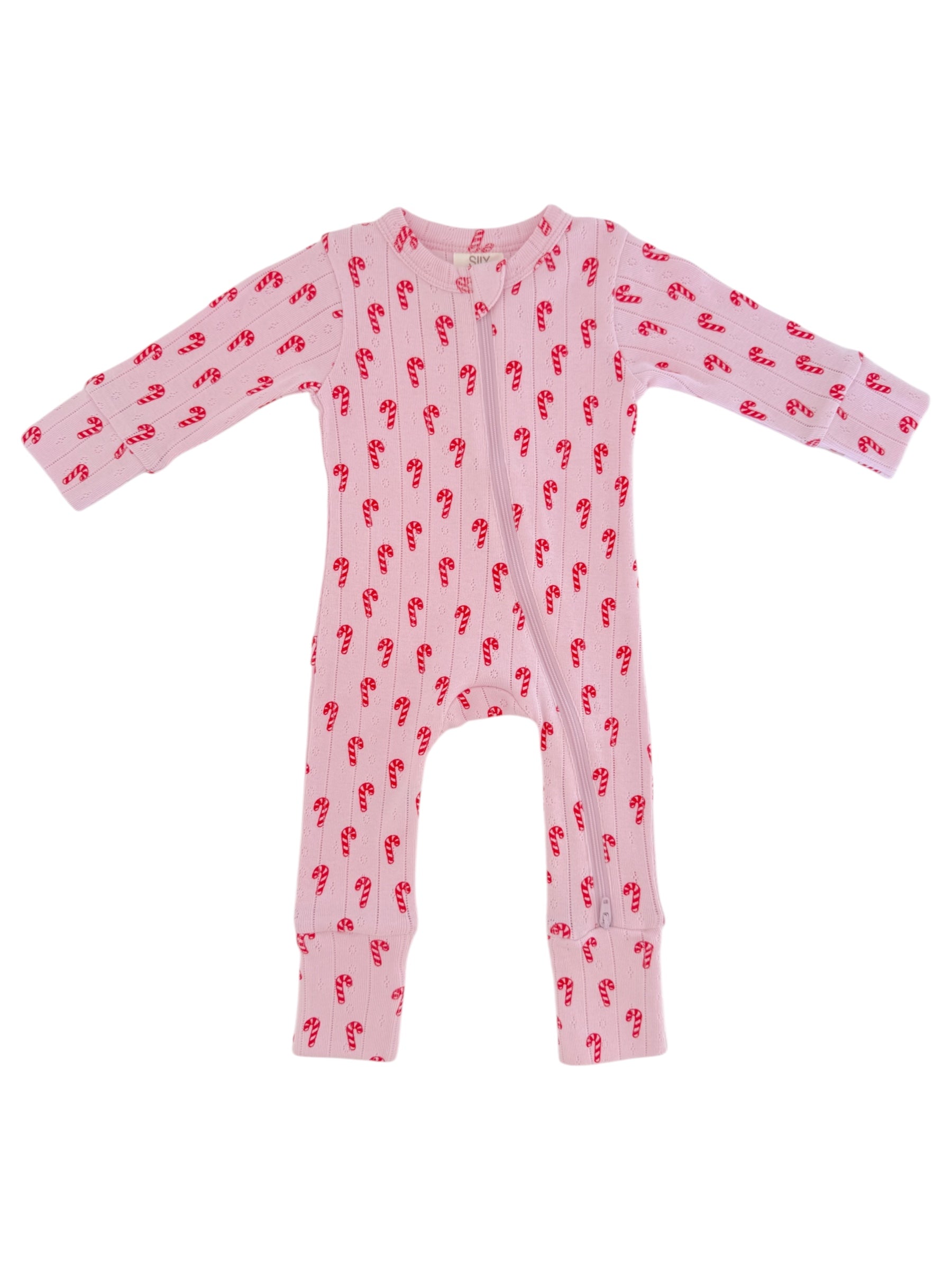 Pink baby onesie with red candy cane pattern and long sleeves, zippered front for easy dressing.