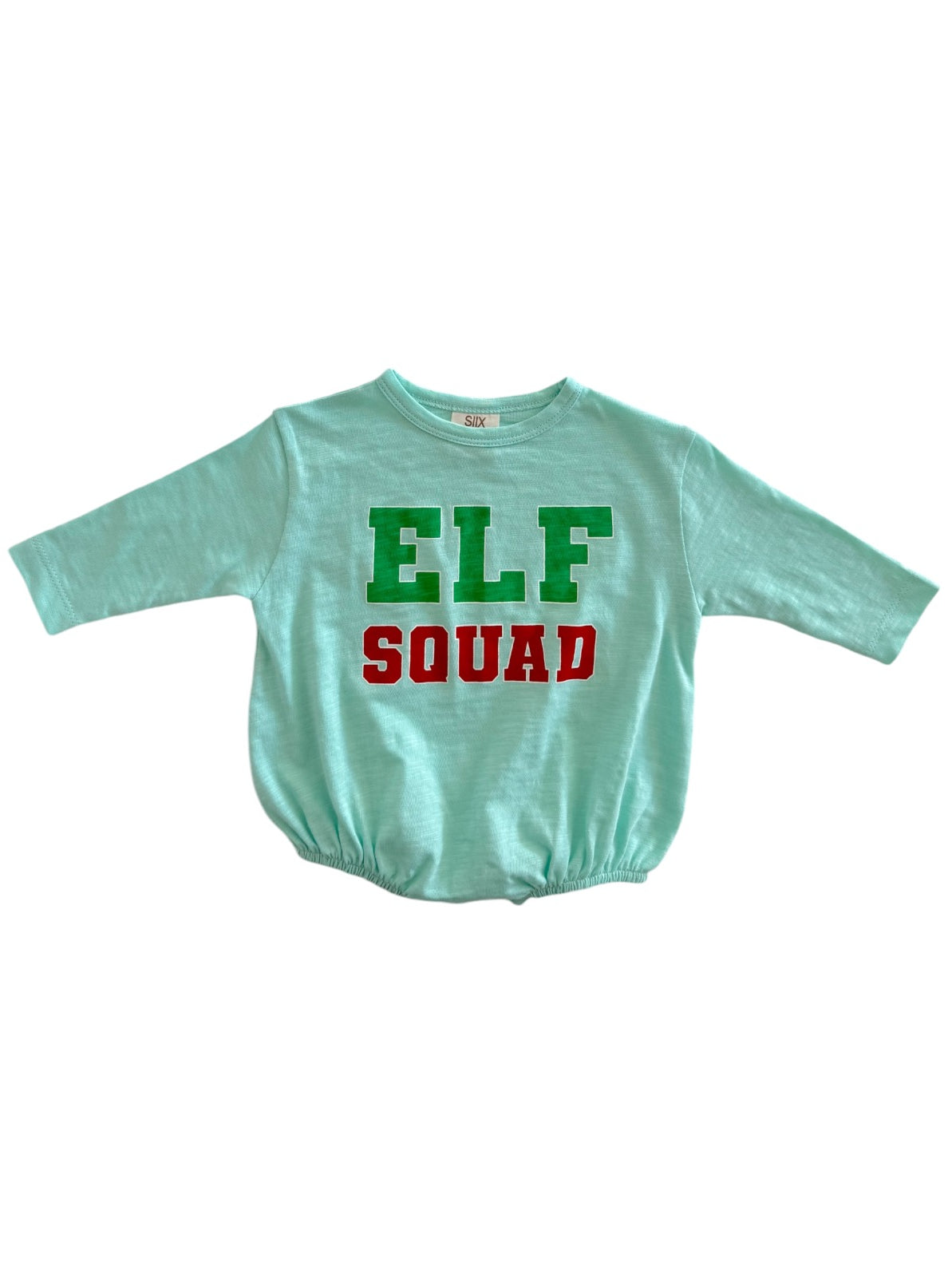 Light blue shirt with "ELF SQUAD" in green and red letters, featuring long sleeves and a gathered hem.