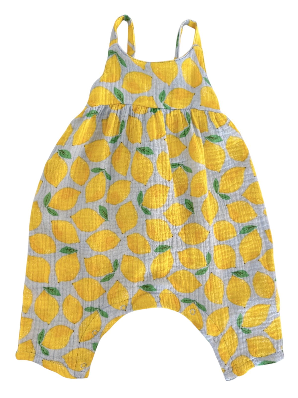 Light blue romper with a lemon pattern and green leaves, perfect for warm weather outfits.