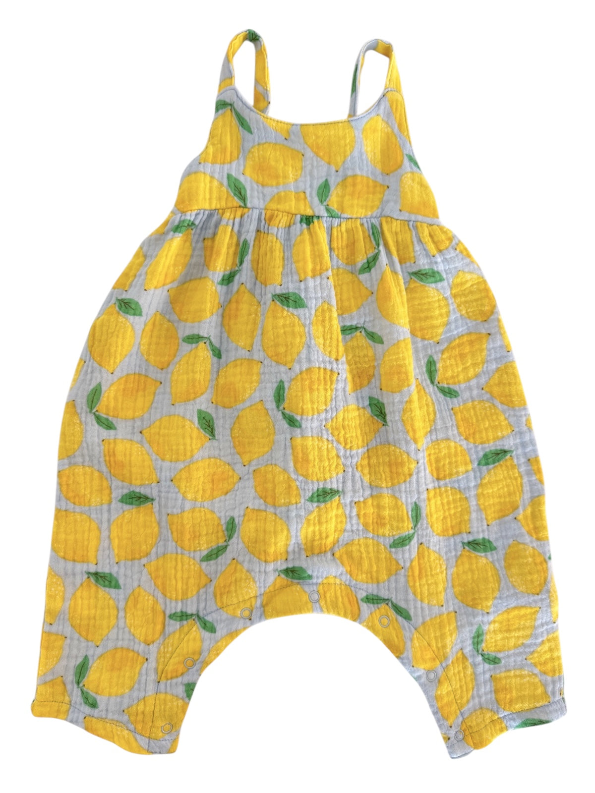 Light blue romper with a lemon pattern and green leaves, perfect for warm weather outfits.