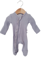 Light purple baby onesie with ruffle detail, displayed on a wooden hanger against a white background.