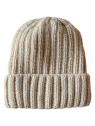 Cream-colored knit beanie hat with a ribbed texture and folded brim.