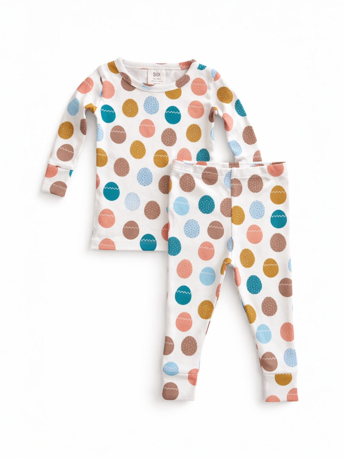 Colorful polka dot toddler pajama set featuring a long-sleeve top and matching pants.