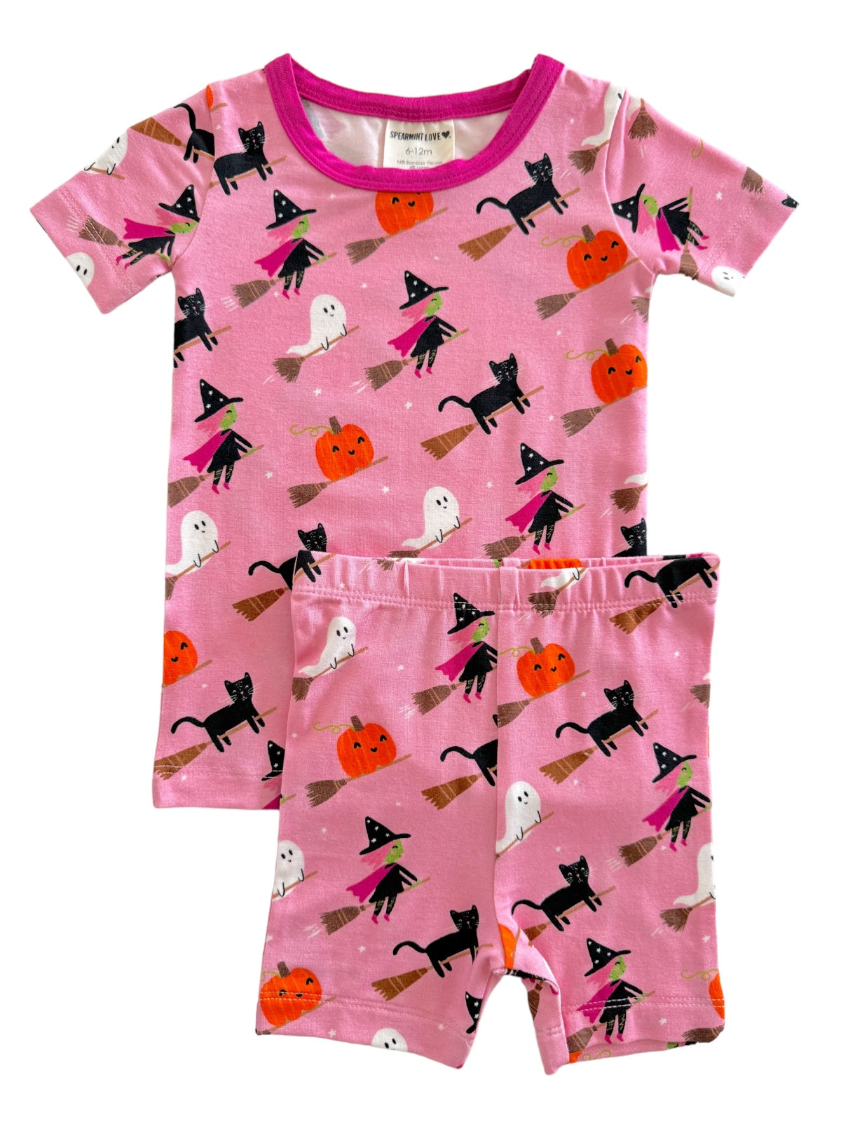 Pink children's Halloween-themed pajamas featuring ghosts, cats, witches, and pumpkins. Size 6-12 months.