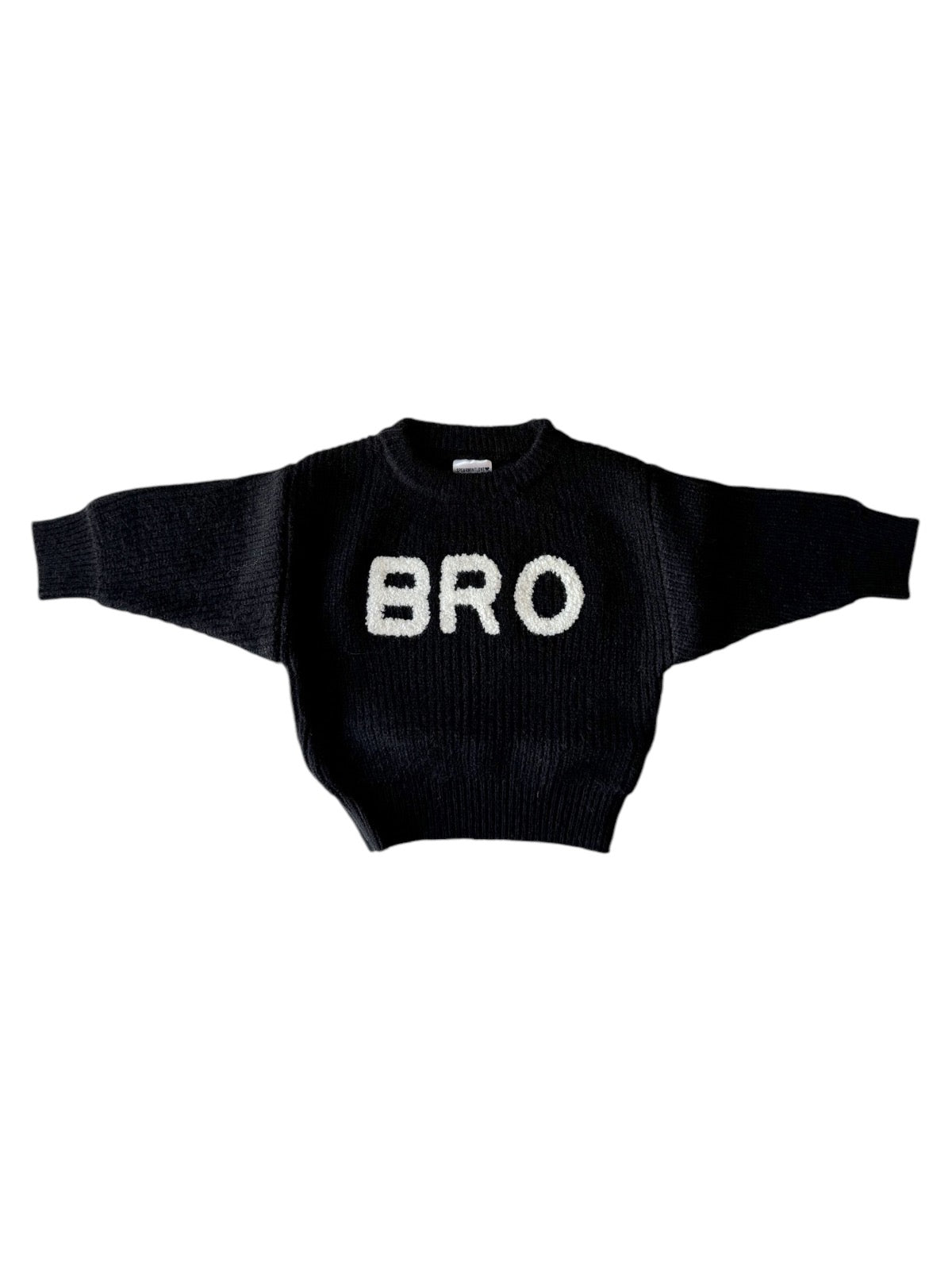 Black sweater featuring the word "BRO" in bold, contrasting white letters across the front.