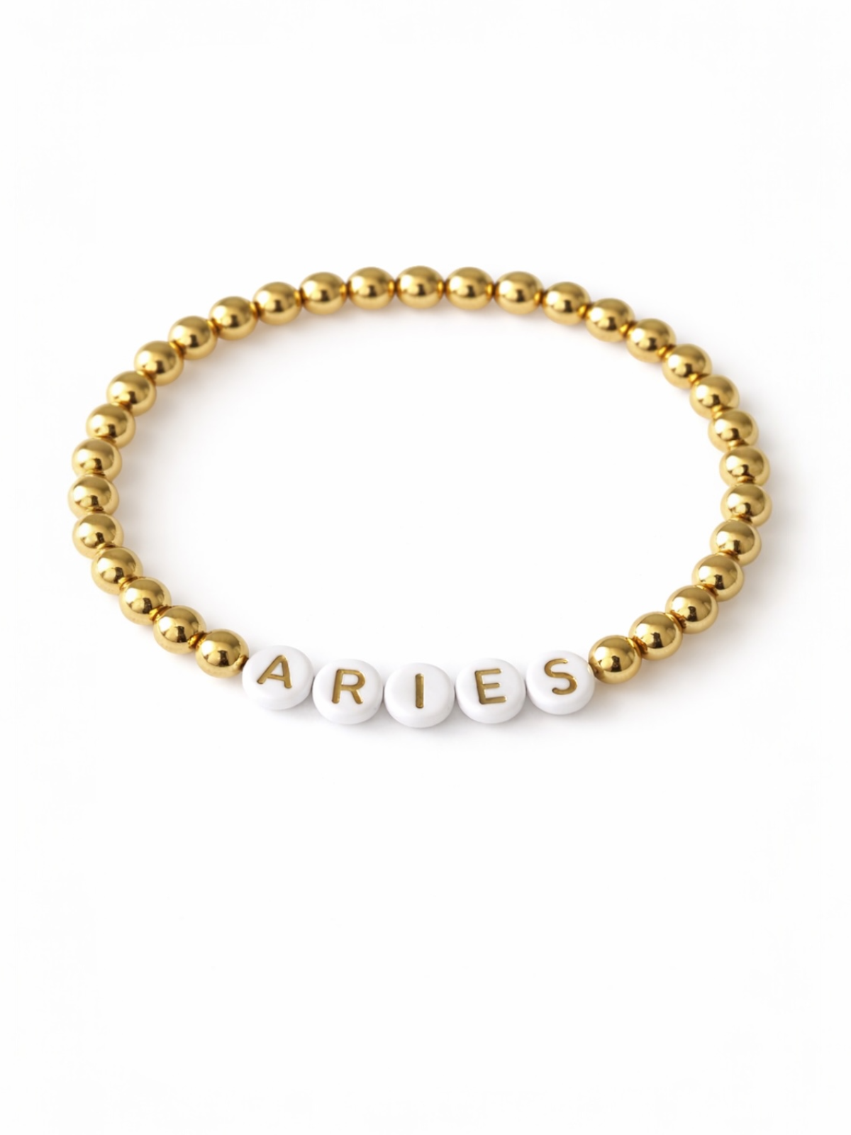 Gold and white beaded bracelet featuring the text "ARIES."
