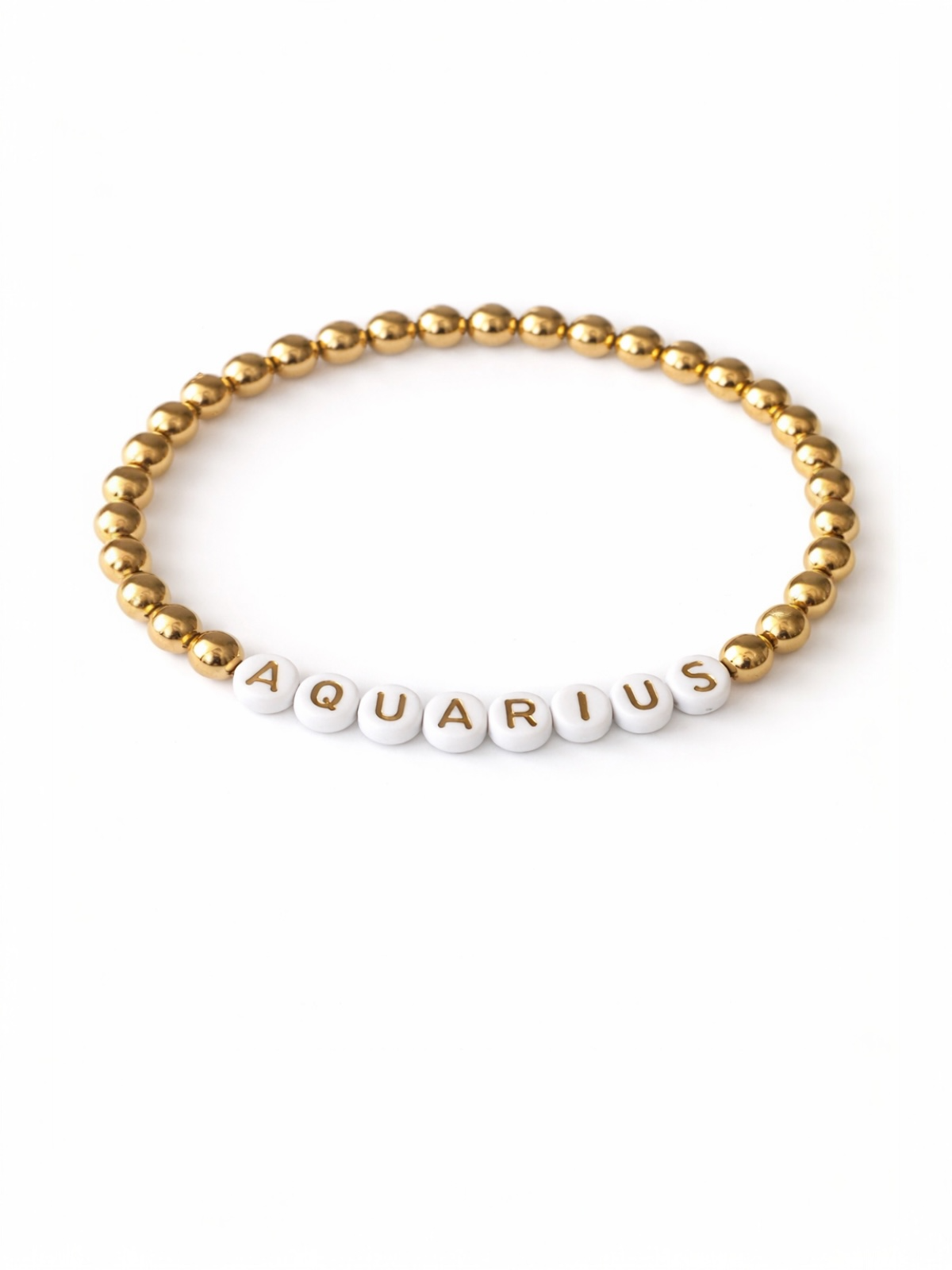 Gold and white beaded bracelet with the word "AQUARIUS" displayed prominently.