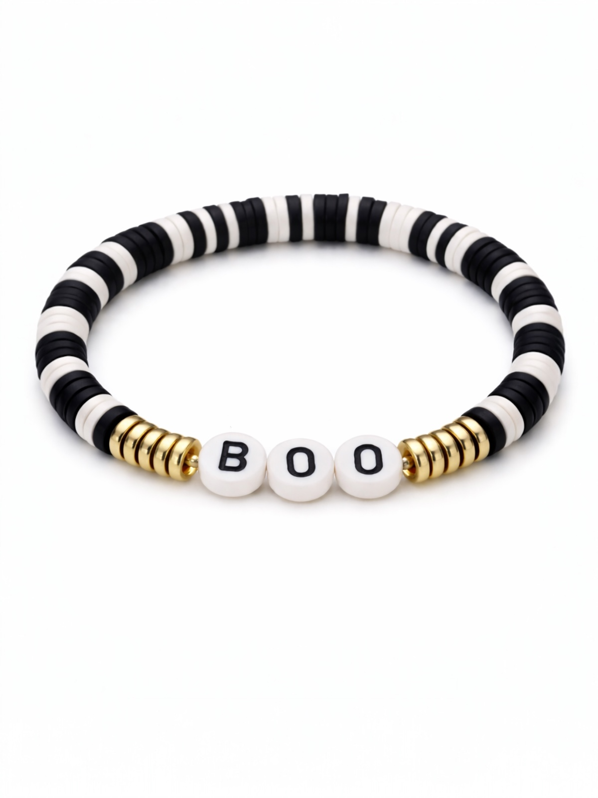 Black and white striped bracelet with gold accents featuring the beads that spell "BOO."
