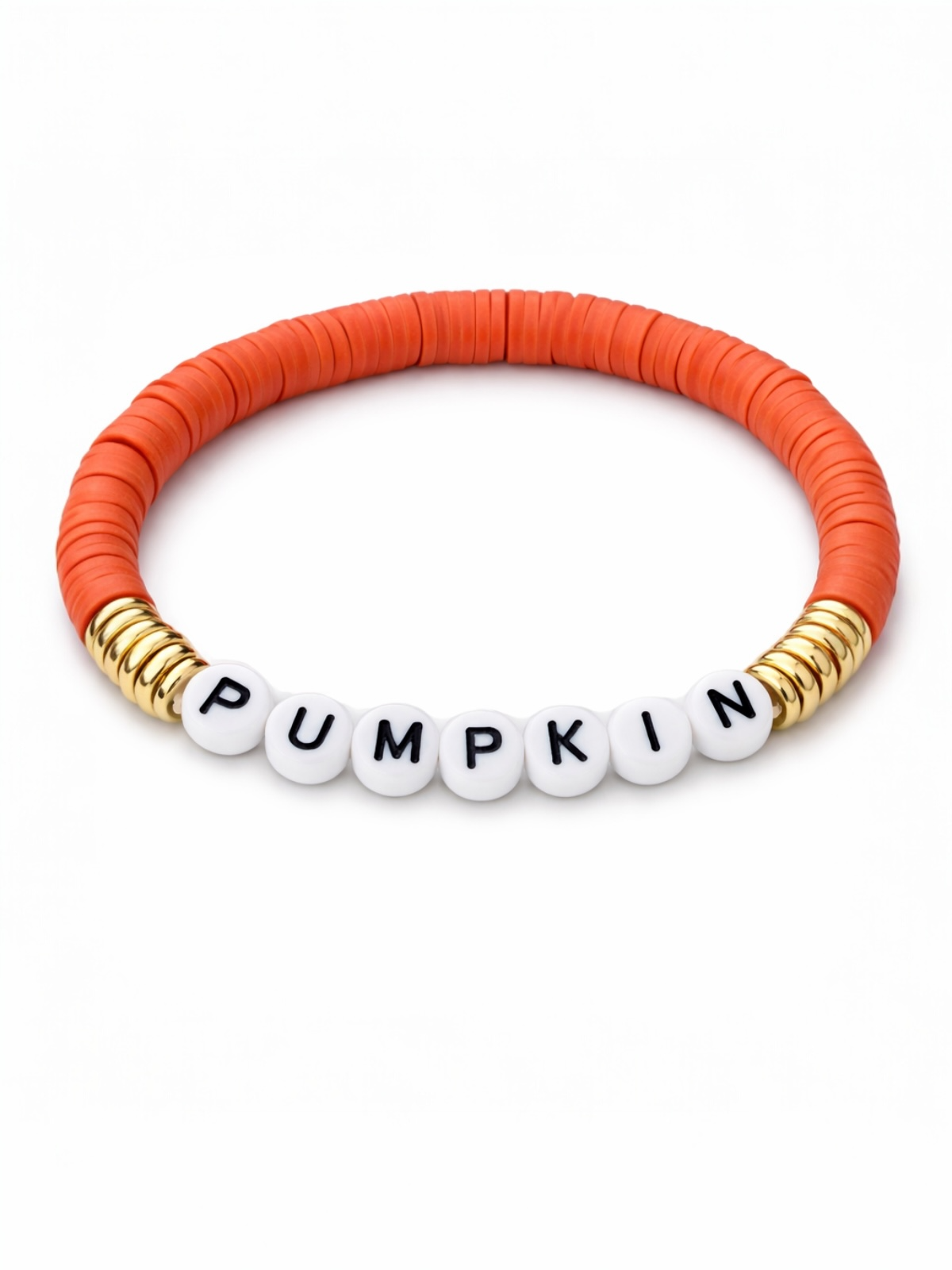 Orange beaded bracelet with white letter beads spelling "PUMPKIN" and gold accents.