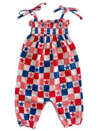 Red, white, and blue checkered jumpsuit with star patterns and tie straps.