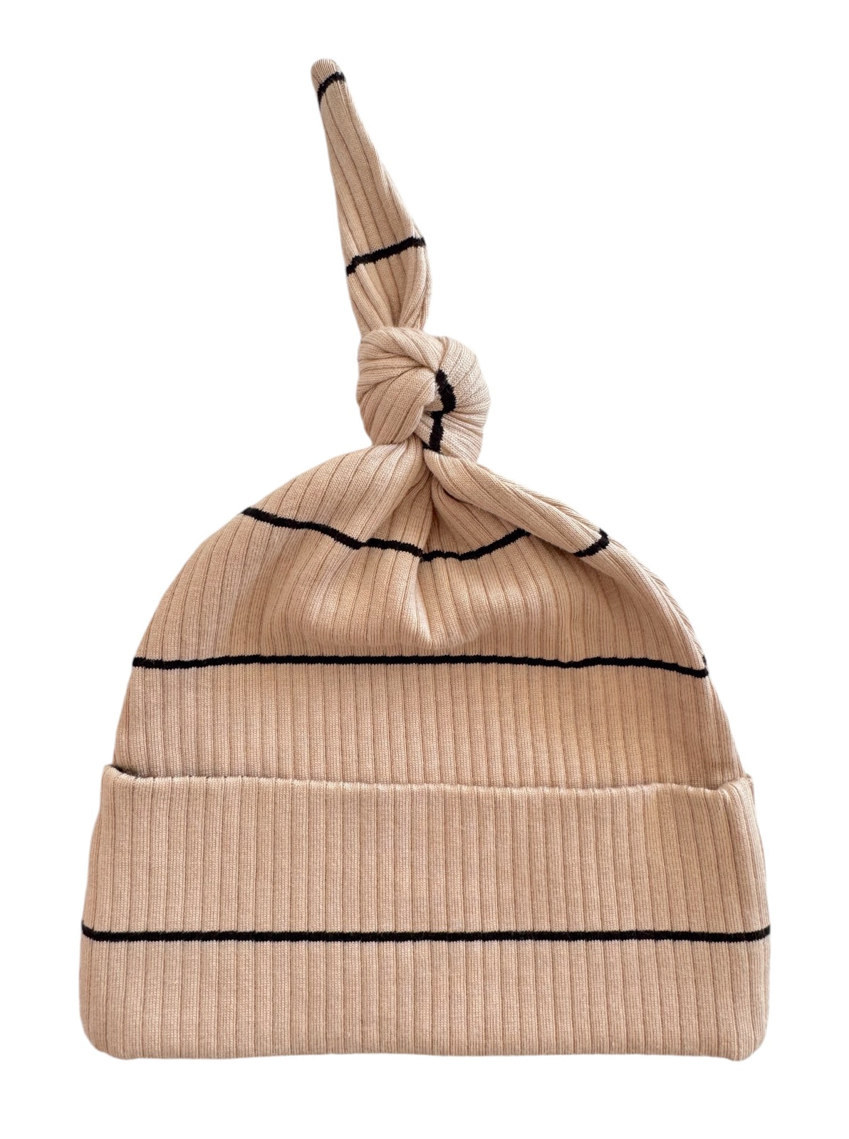 Beige ribbed knit baby hat with a knot on top and black stripes.