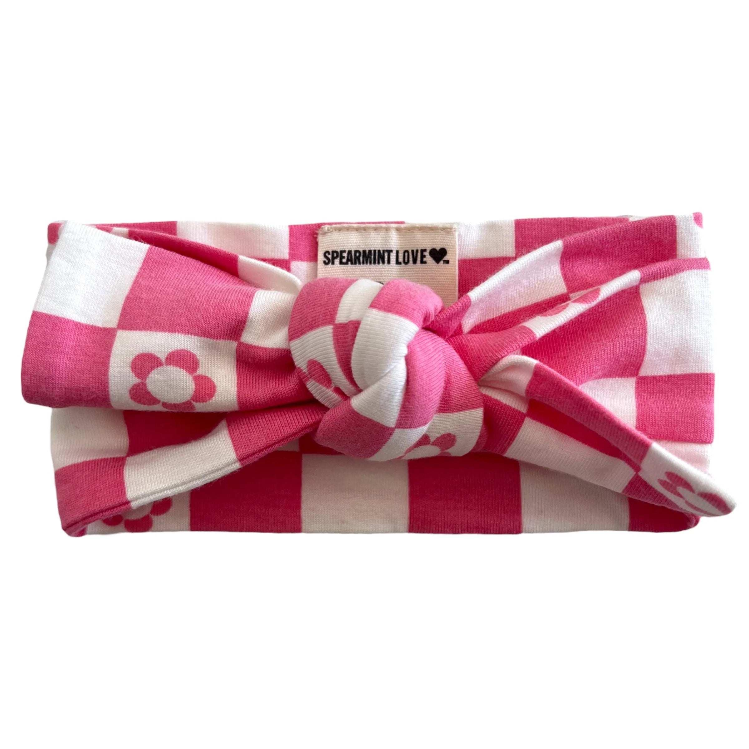 Pink and white checkered knot headband with flower design, labeled "SPEARMINT LOVE."