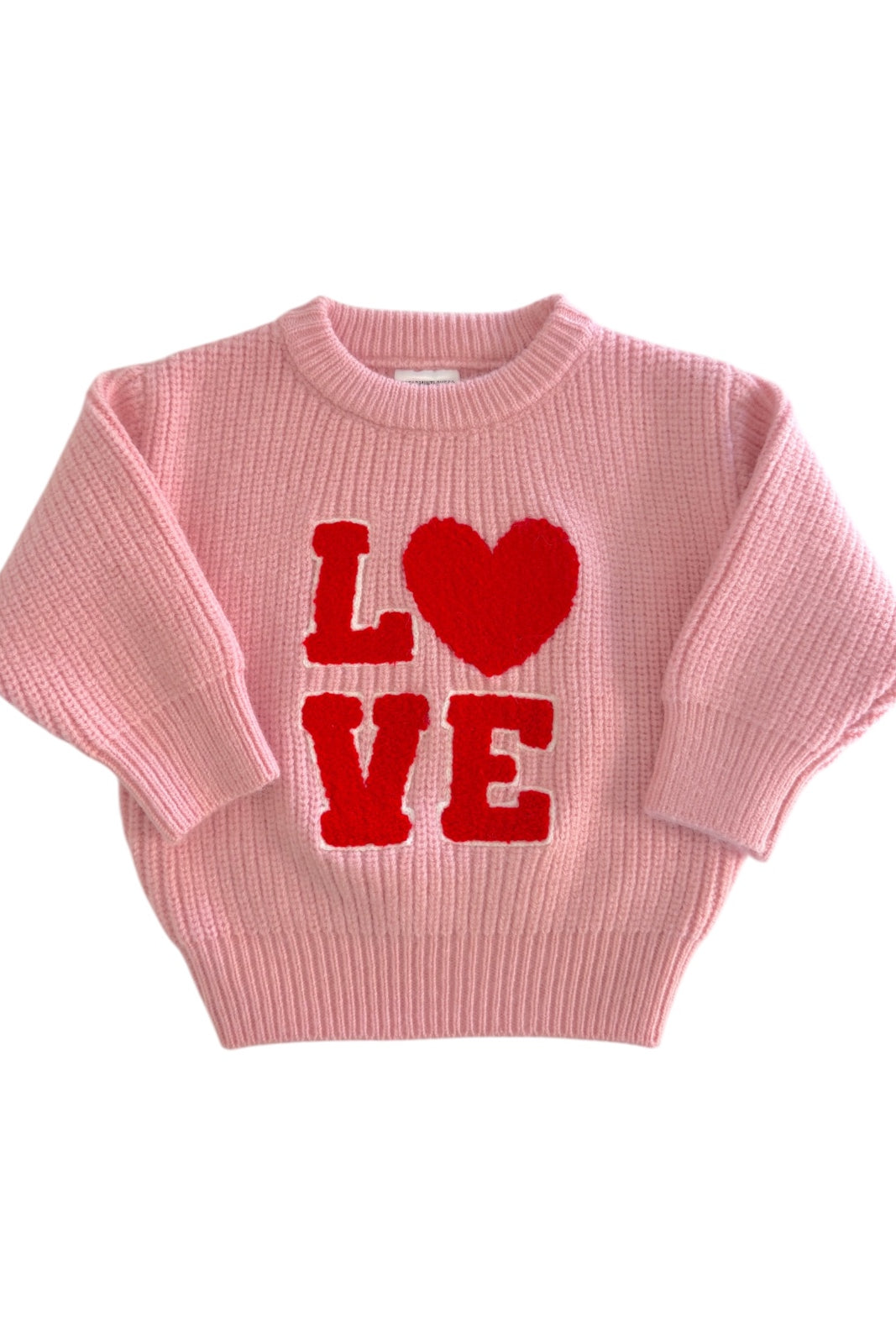 Pink sweater with red "LOVE" text and a heart detail, perfect for a casual, stylish look.