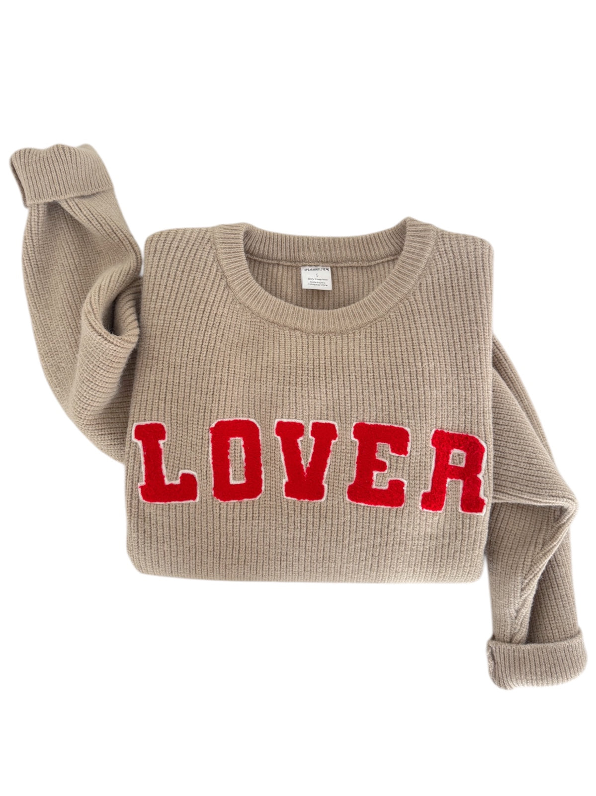 Beige sweater with ribbed texture and red "LOVER" graphic across the front, styled casually.