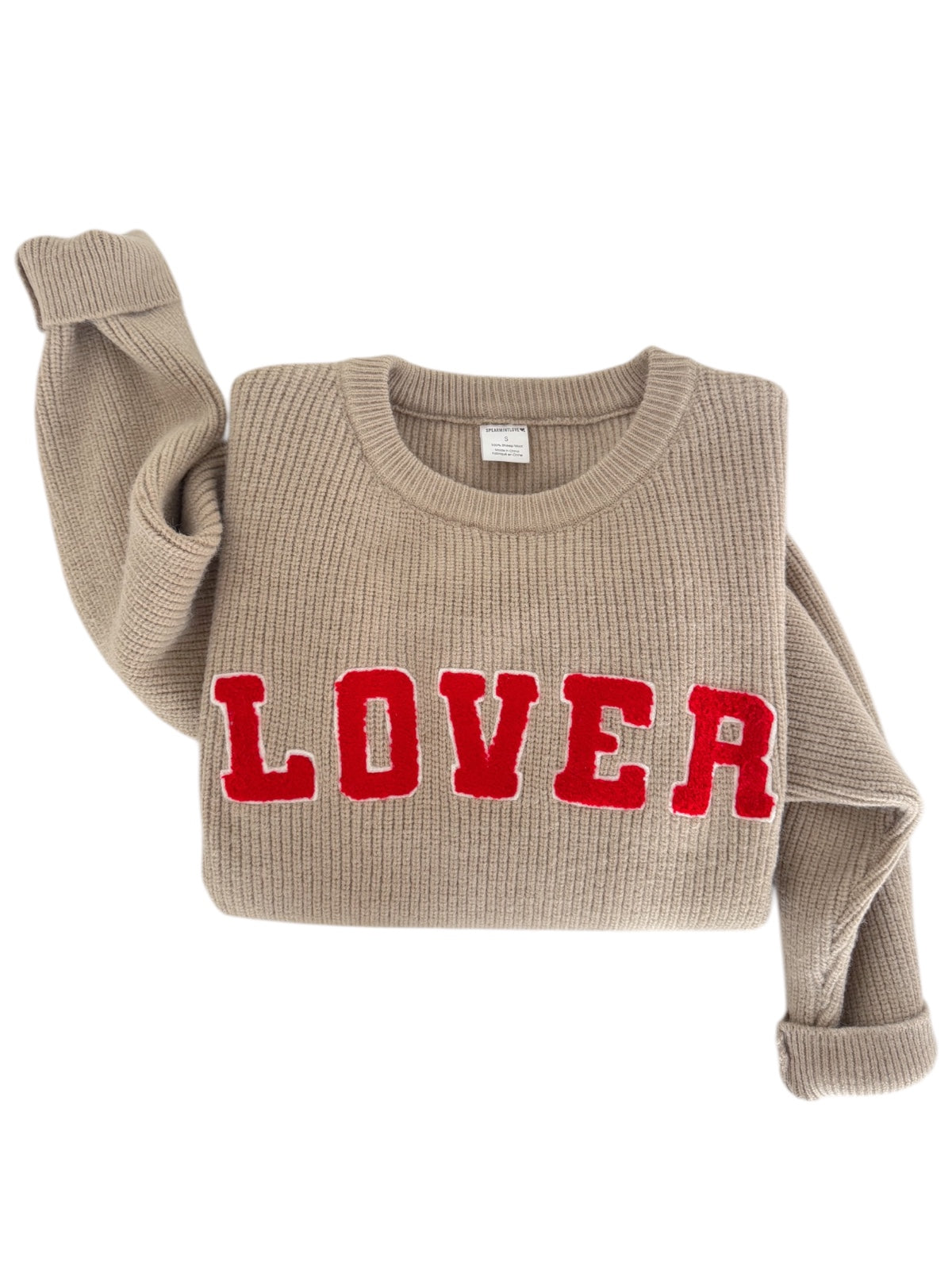 Beige sweater with ribbed texture and red "LOVER" graphic across the front, styled casually.