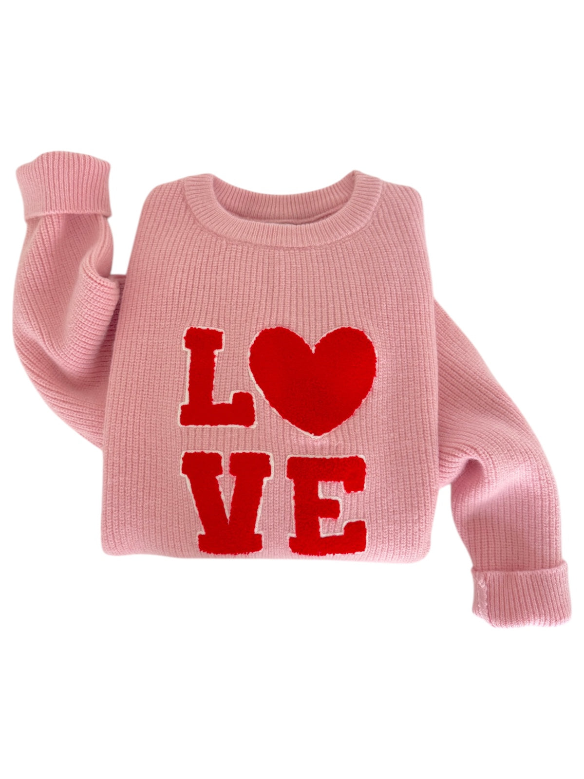 Pink sweater featuring red "I ❤️ LOVE" text graphic on the front.