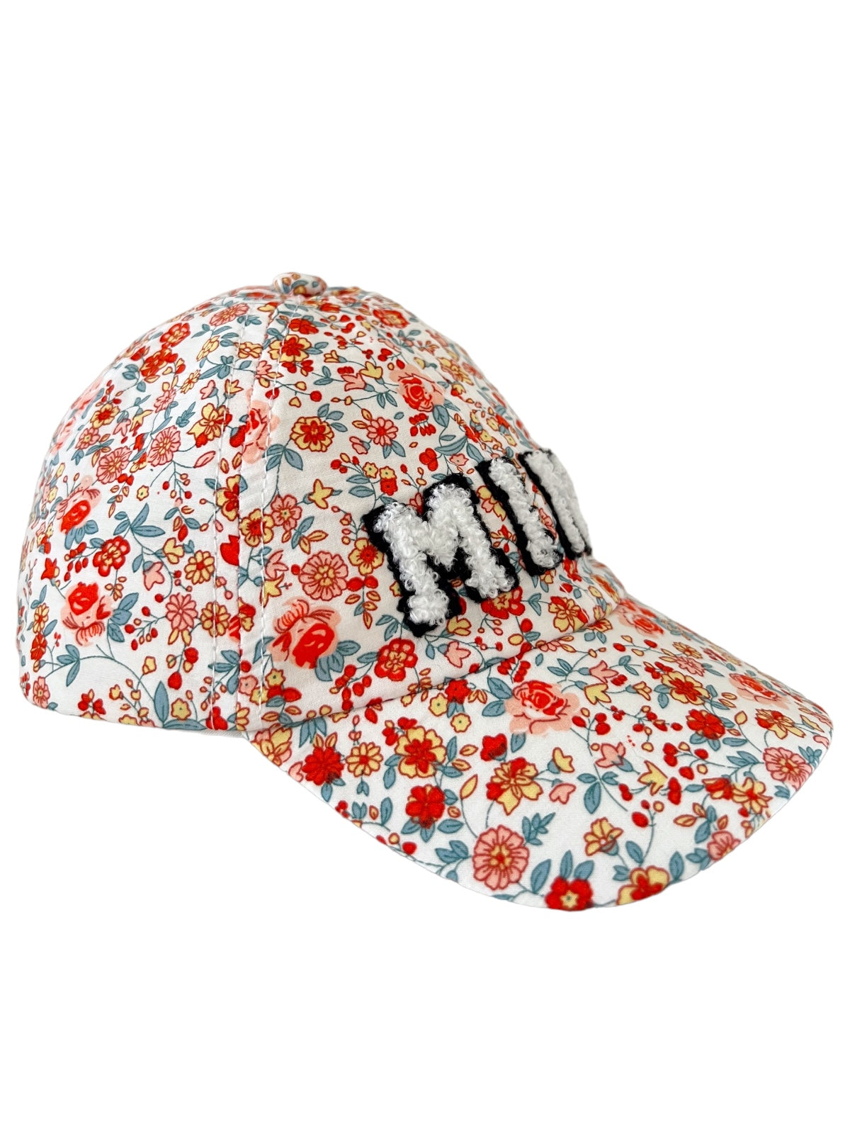 Floral baseball cap with "MINI" text in chunky white lettering on the front.