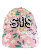 Pink floral cap with "SIS" embroidered on the front in textured letters.