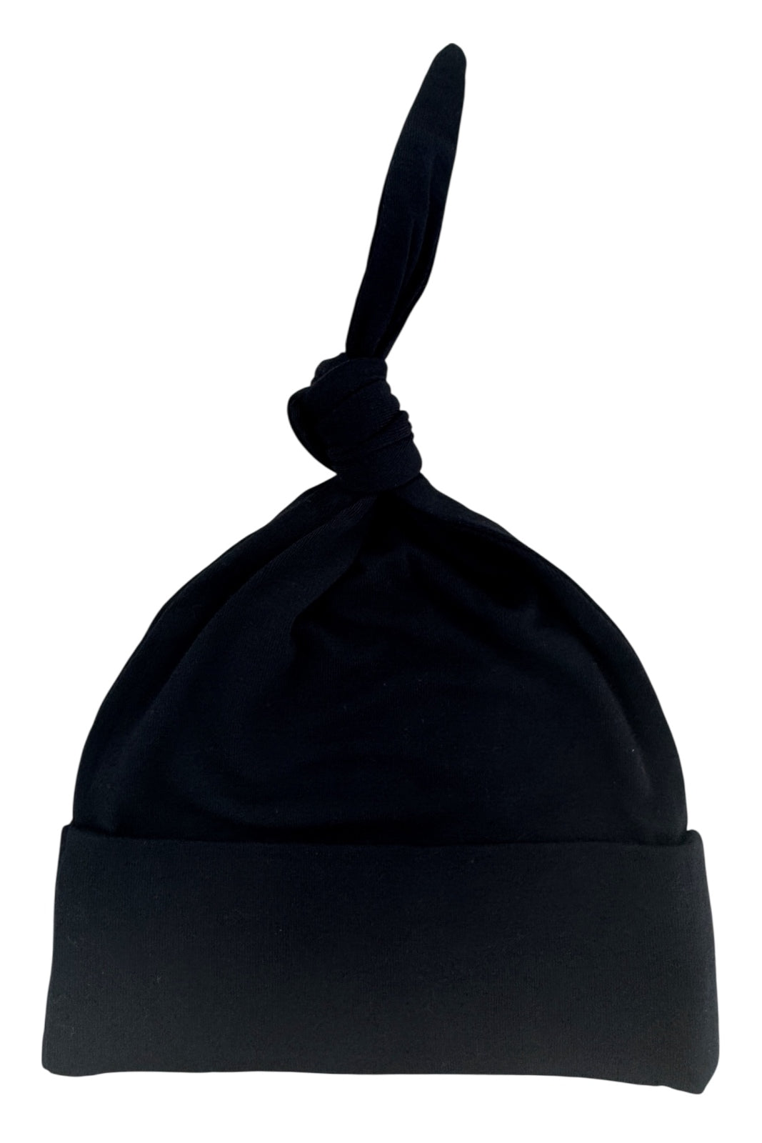 Black beanie hat with a knot on top and a folded hem. Ideal for stylish warmth and comfort.