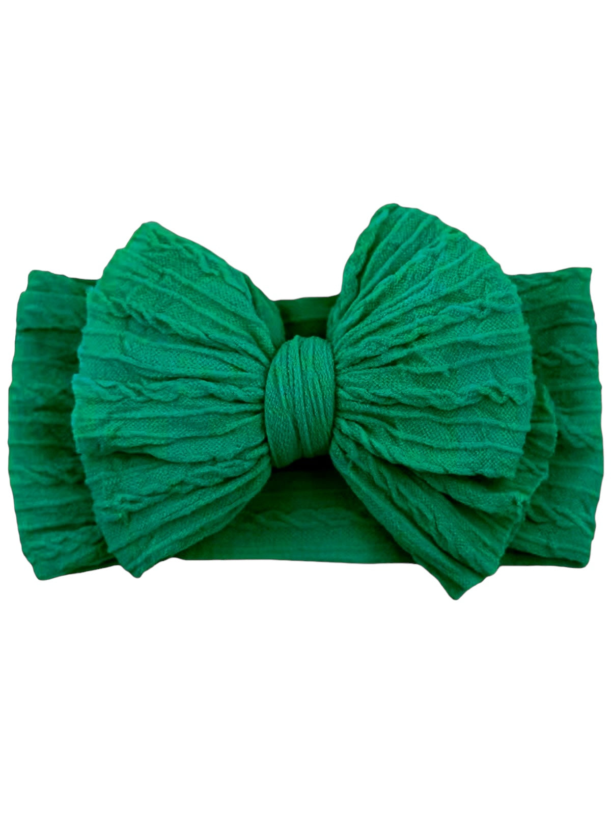 Green textured headband with a large bow, ideal for fashion accessories.