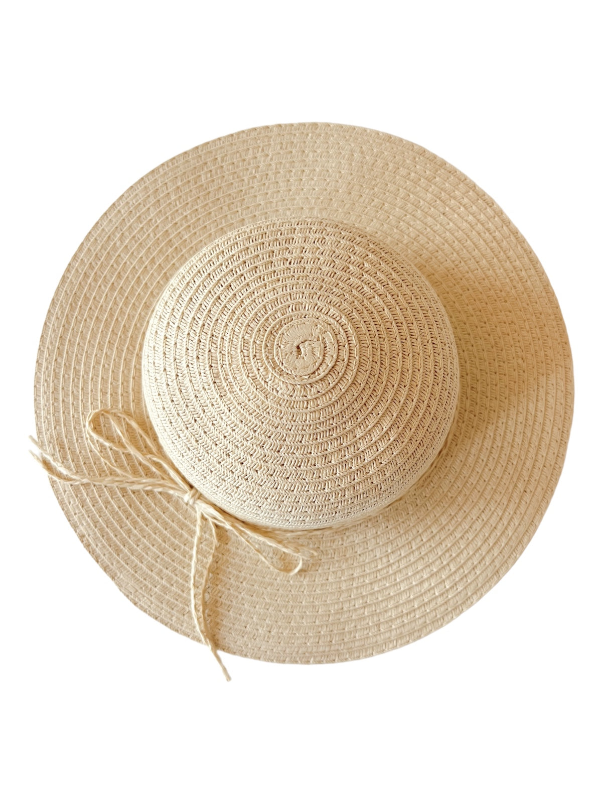 Wide-brimmed straw hat with a round crown and ribbon detail, ideal for sun protection and style.