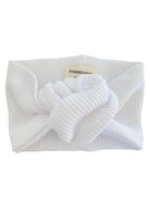 White textured headband with a knot detail, perfect for hair styling or keeping hair away from the face.