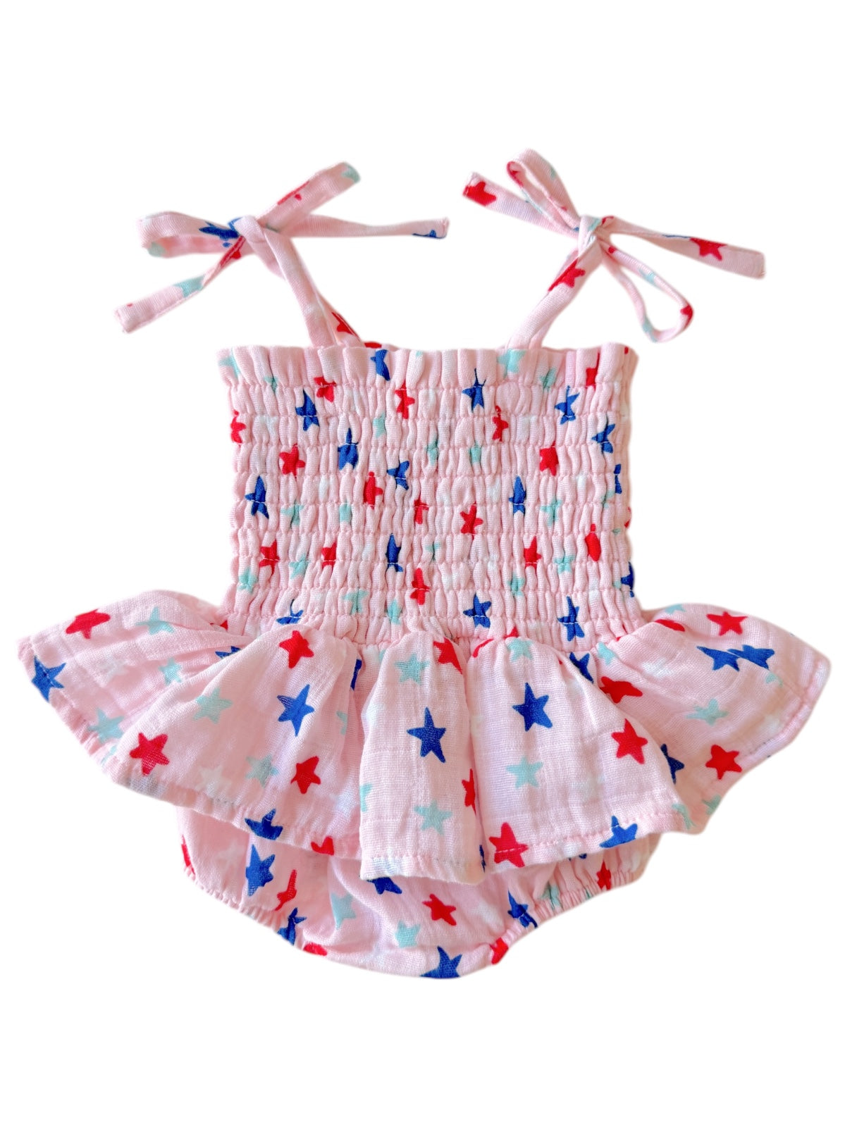 Pink toddler swimsuit with star pattern and flared skirt, featuring adjustable straps. Ideal for summer wear.