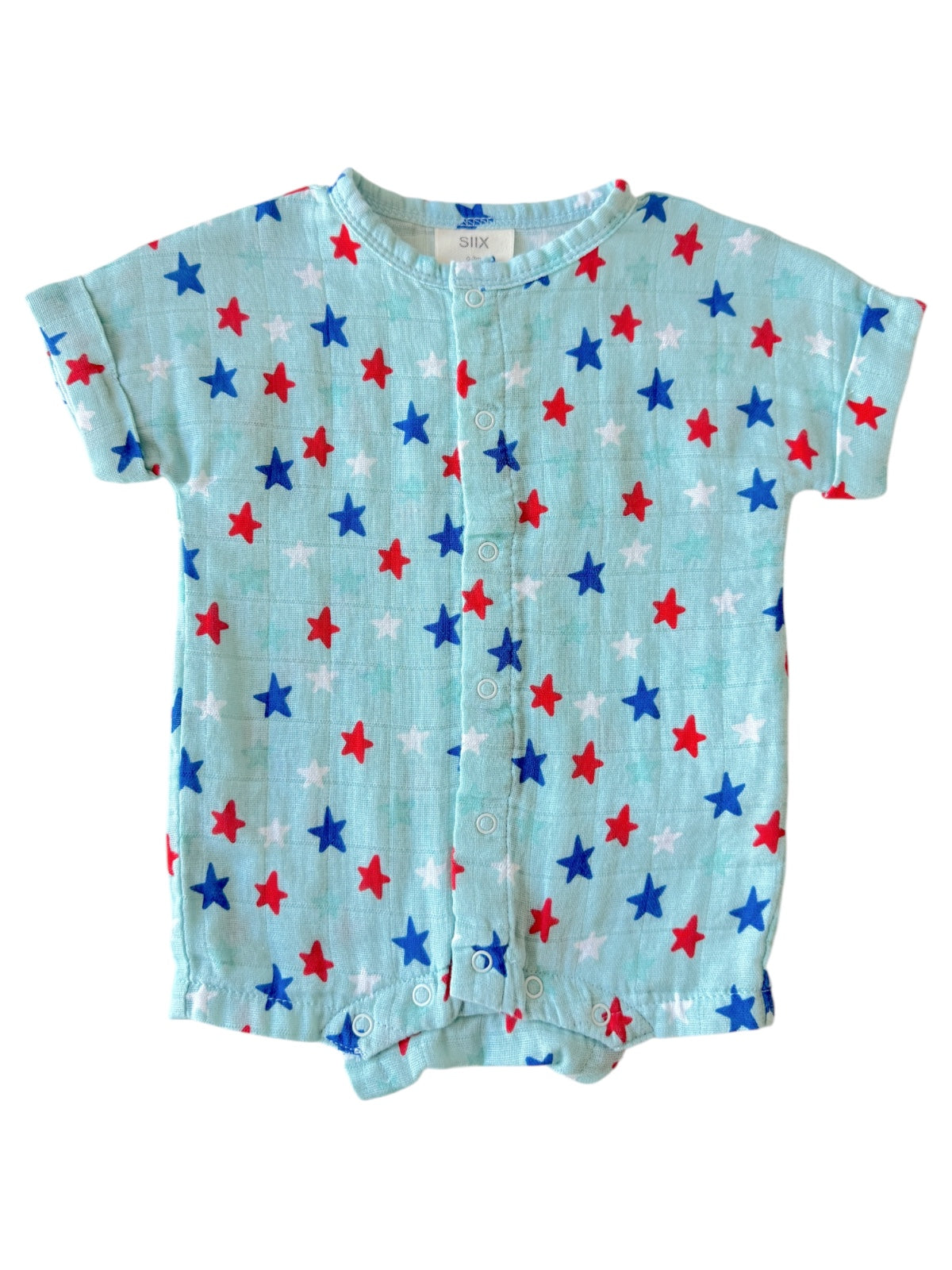 Light blue baby romper with red, white, and blue star patterns, featuring short sleeves and button closure.