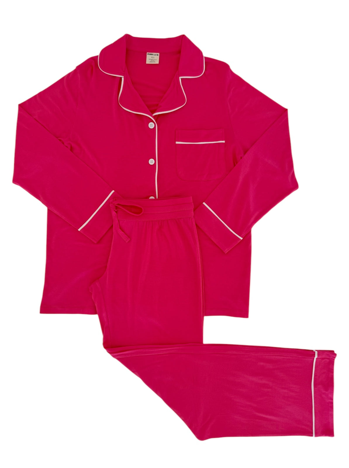 Bright pink pajama set featuring a button-up top with pocket and matching pants. Ideal for comfort and relaxation.