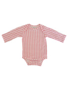 Light pink gingham long-sleeve onesie for infants with snap closure at the bottom.