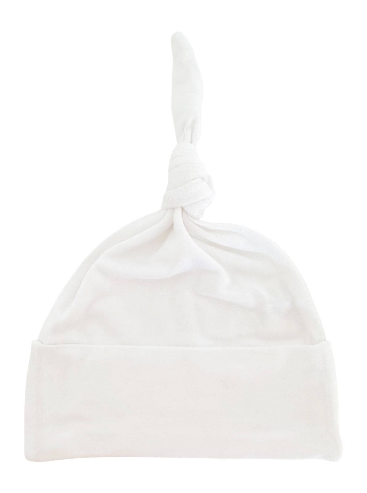 White baby hat with a knotted top and folded cuff, made of soft fabric.