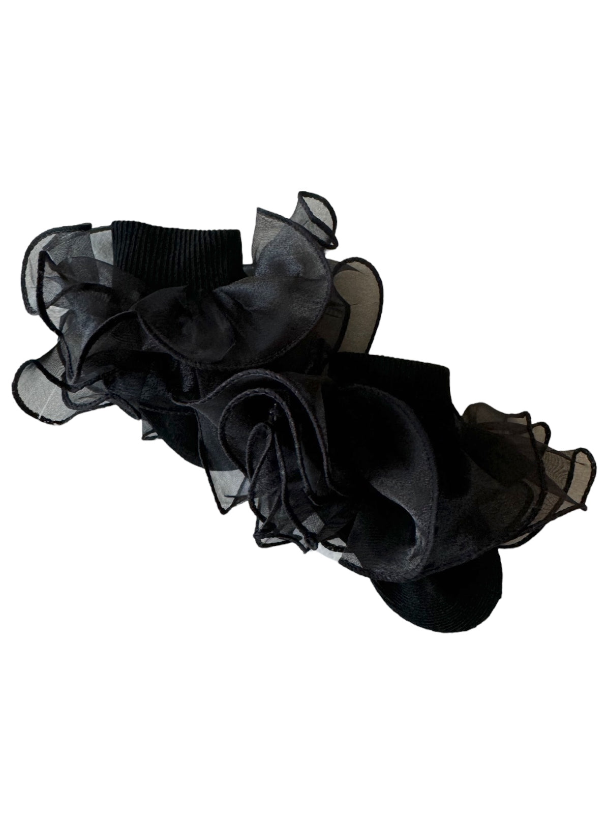 Black socks adorned with layered, sheer ruffles, adding a stylish and feminine touch.