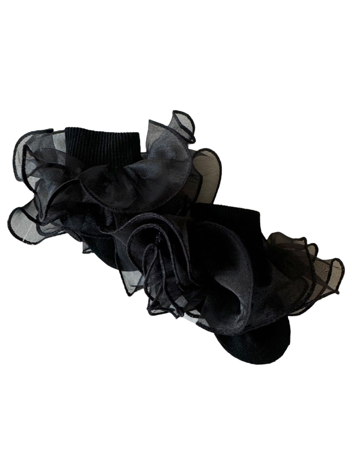 Black socks adorned with layered, sheer ruffles, adding a stylish and feminine touch.