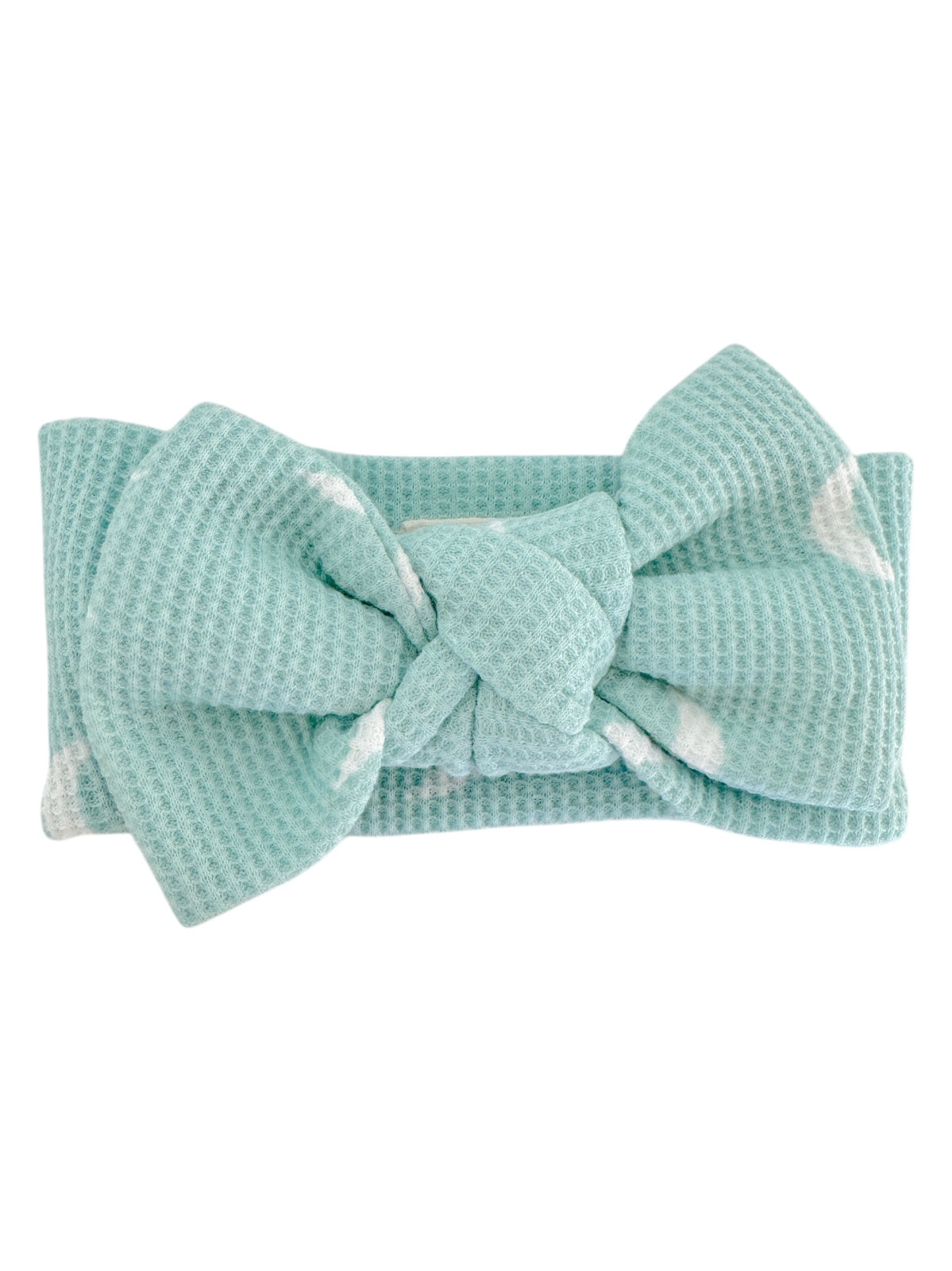 Mint green textured headband with a large bow detail. Soft and stylish accessory for women.